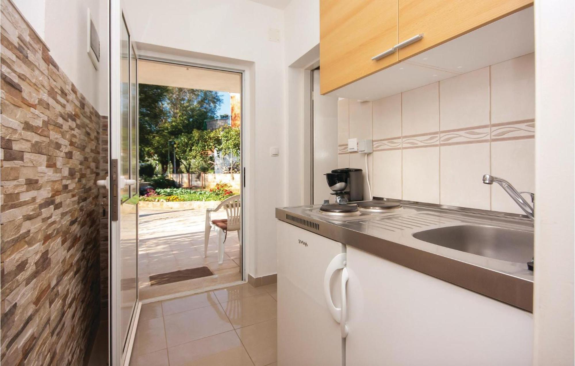 Nice Apartment In Raslina With House Sea View Esterno foto